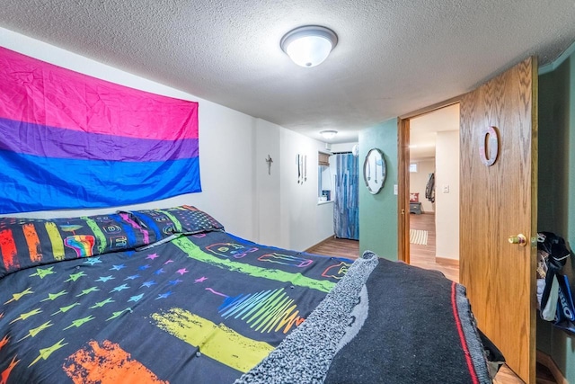 bedroom featuring a textured ceiling