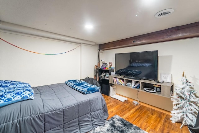 bedroom featuring hardwood / wood-style floors