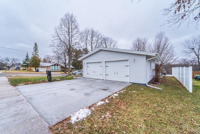 garage featuring a yard