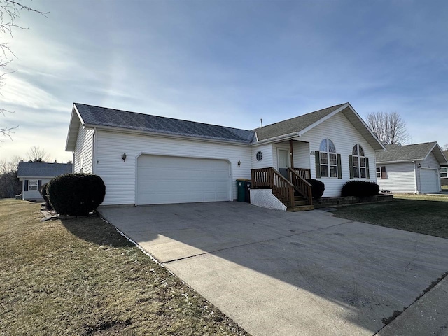 ranch-style home featuring a front yard and a garage