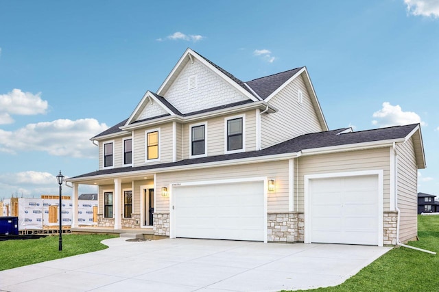 view of front facade with a porch and a front lawn