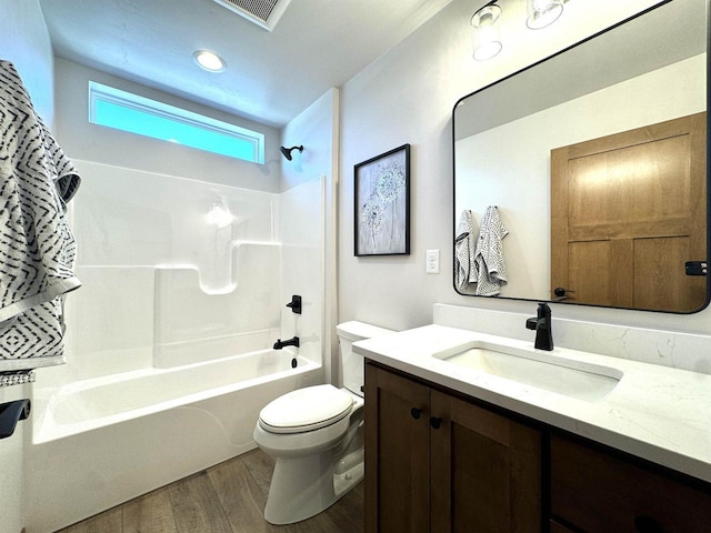 1217 Bay Mist Dr, Green Bay, WI 54311 - full bathroom with hardwood / wood-style flooring, vanity, shower / bathtub combination, and toilet
