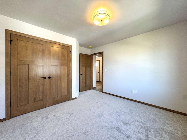 1217 Bay Mist Dr, Green Bay, WI 54311 - unfurnished bedroom featuring light carpet and a closet