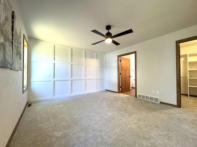 1217 Bay Mist Dr, Green Bay, WI 54311 - unfurnished bedroom featuring light colored carpet and ceiling fan