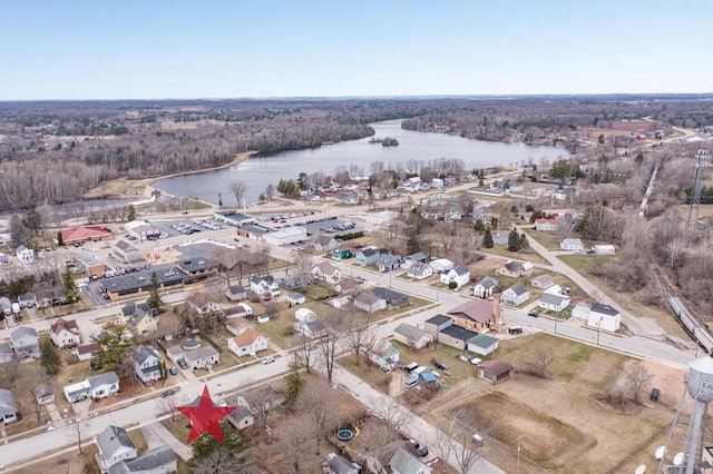 drone / aerial view with a water view