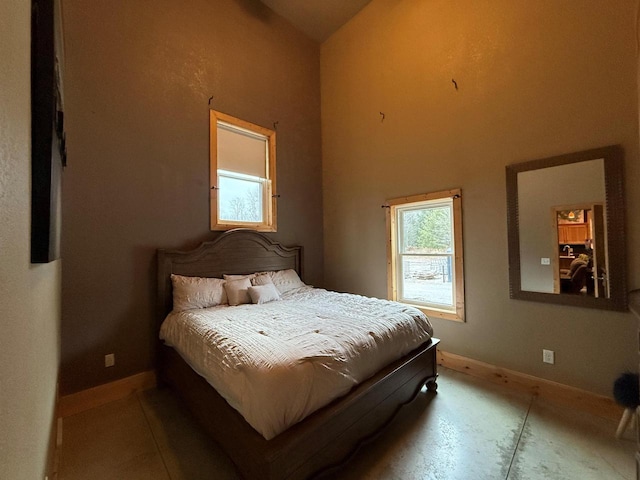 bedroom featuring lofted ceiling