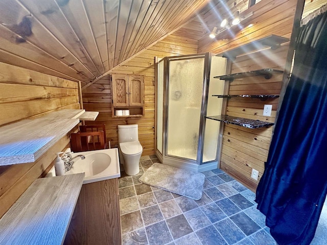 bathroom featuring toilet, vaulted ceiling, wooden ceiling, and wood walls