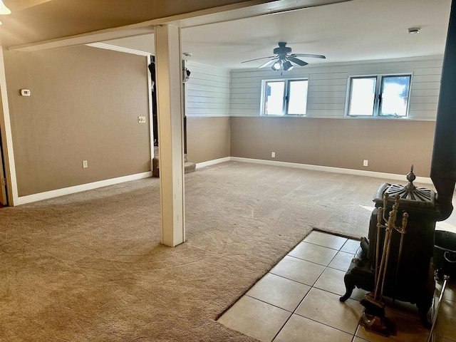 interior space featuring ceiling fan