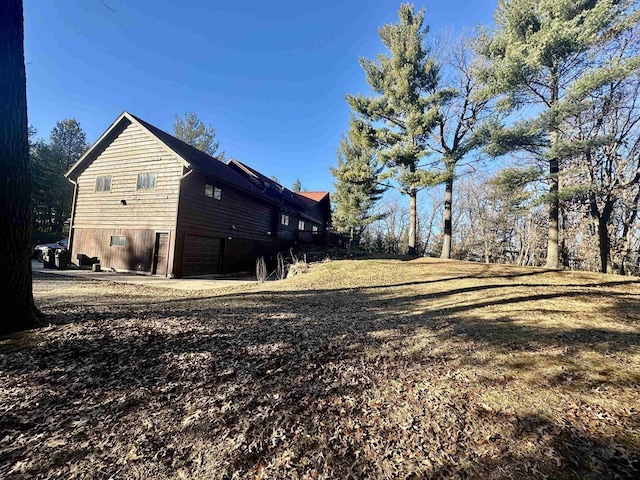 view of home's exterior with a garage