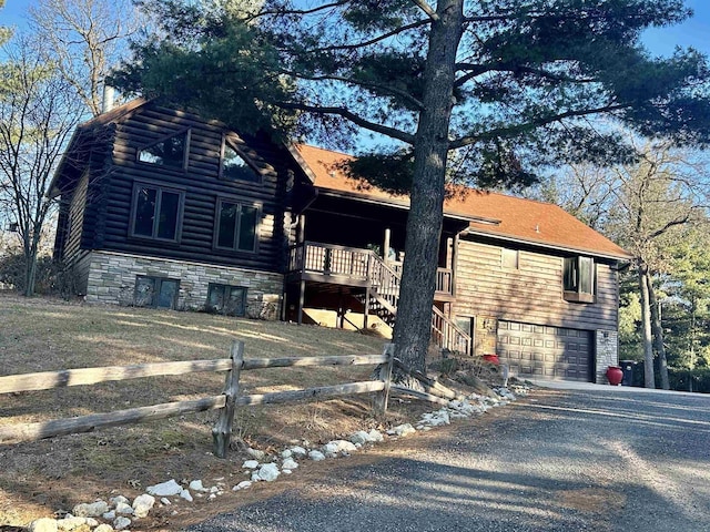 log cabin with a garage