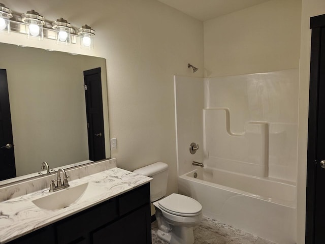 full bathroom featuring toilet, vanity, and bathing tub / shower combination