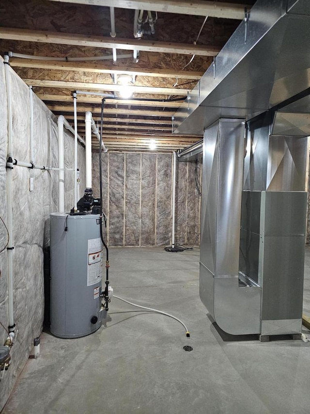 basement with heating unit and gas water heater