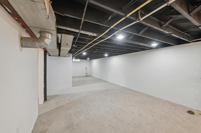 basement with light carpet