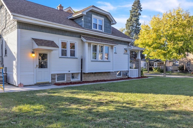 view of front of house with a front yard