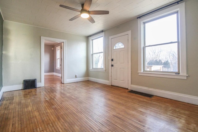 entryway featuring ceiling fan and light hardwood / wood-style flooring