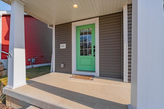 property entrance featuring covered porch