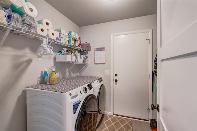 laundry room with washer and dryer