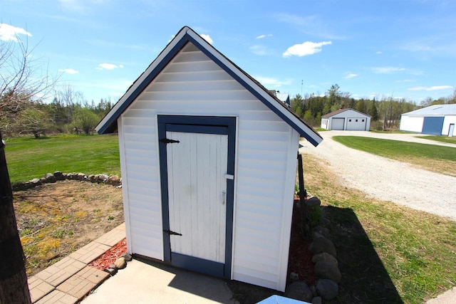 view of outbuilding with a lawn