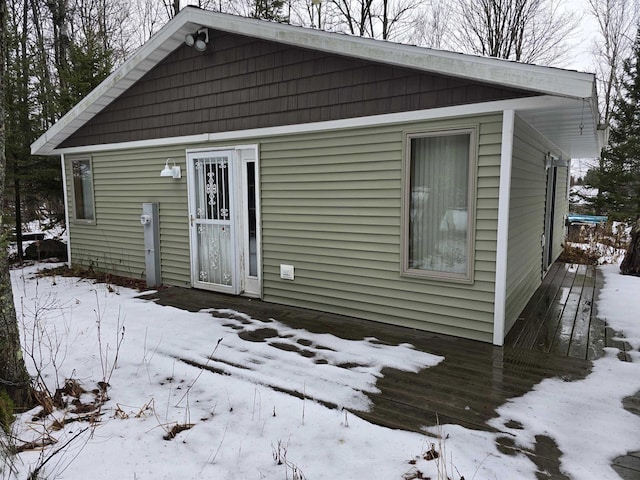 exterior space featuring a wooden deck