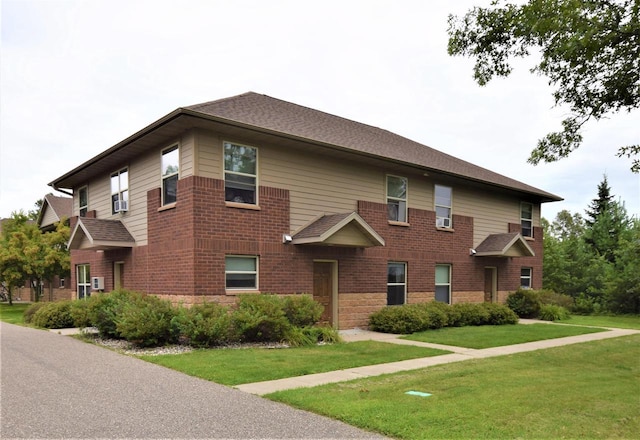 view of front facade with a front lawn