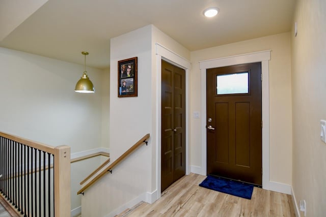 entrance foyer featuring light wood-type flooring