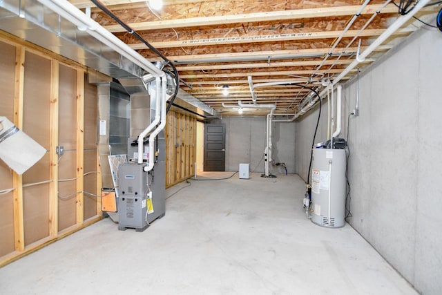 basement with heating unit and water heater