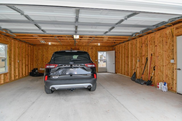 garage with wood walls