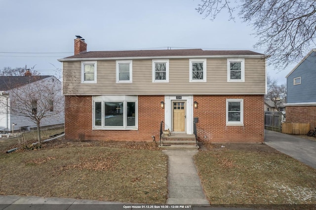 view of front of property with a front lawn