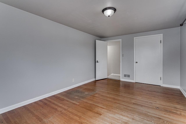 unfurnished bedroom with light hardwood / wood-style floors