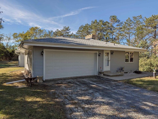 ranch-style home with a garage