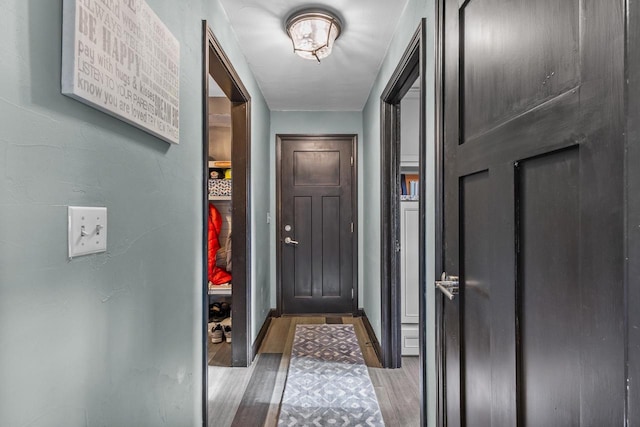 doorway to outside featuring light wood-type flooring