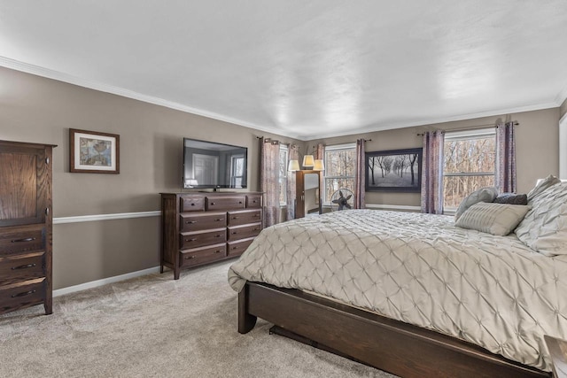 carpeted bedroom with multiple windows and ornamental molding