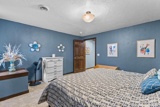 bedroom featuring light carpet