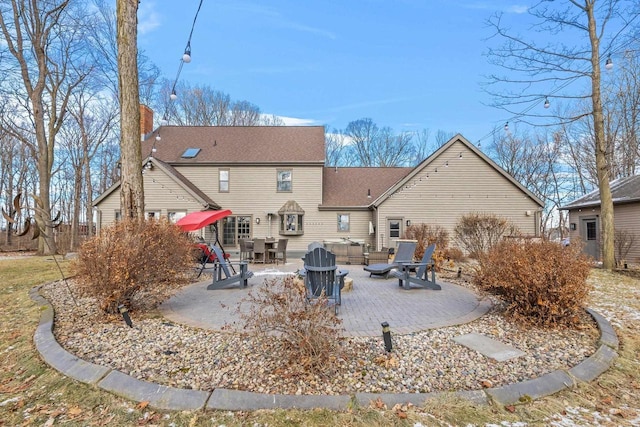 rear view of house featuring a patio area