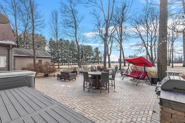 view of patio with a hot tub