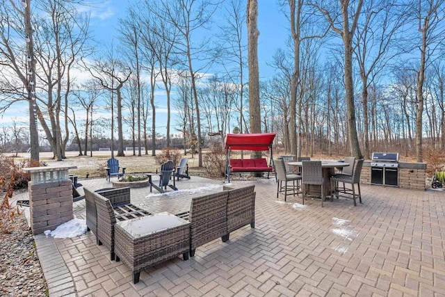 view of patio featuring a grill and exterior kitchen