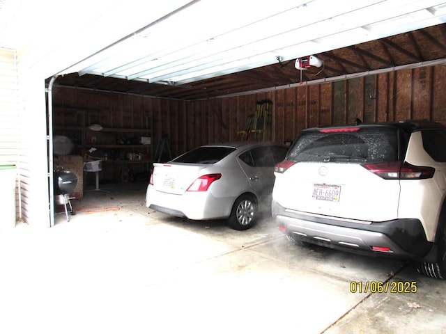 garage featuring a garage door opener