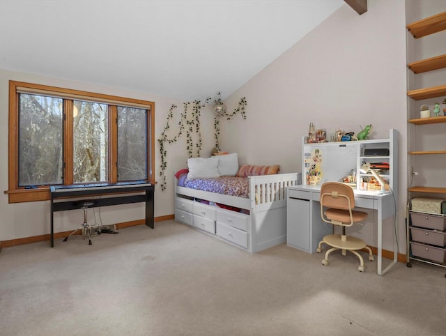 carpeted bedroom with lofted ceiling with beams