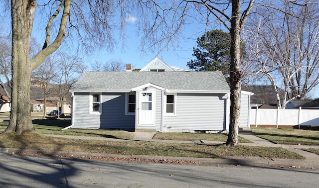 view of front of home with a front lawn