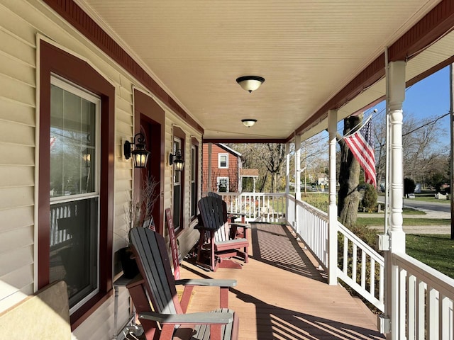 wooden terrace featuring a porch