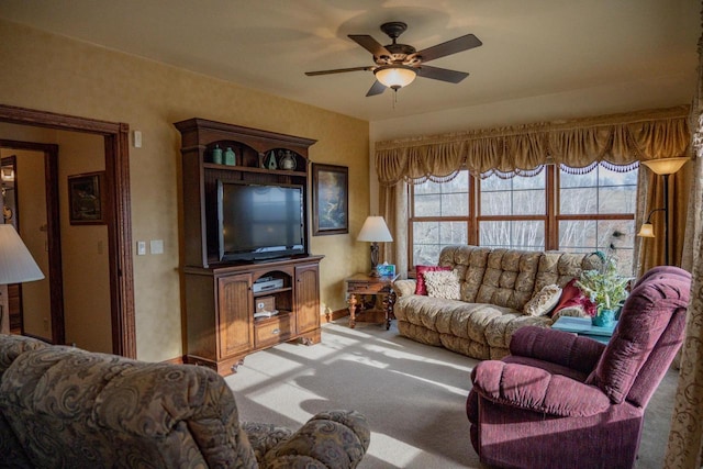 living room featuring ceiling fan and light colored carpet