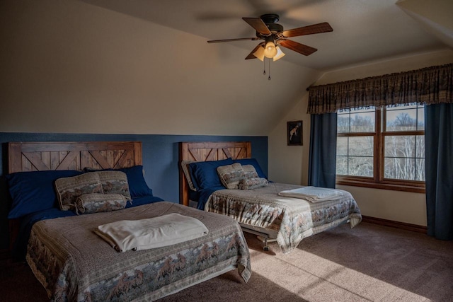 bedroom featuring ceiling fan, light colored carpet, and vaulted ceiling