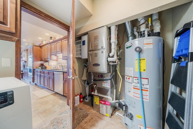 utilities with gas water heater and sink