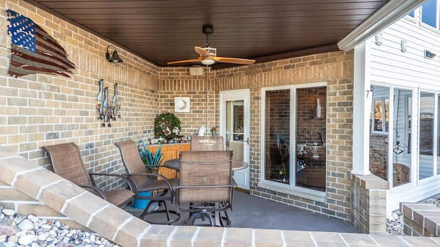 view of patio / terrace featuring ceiling fan