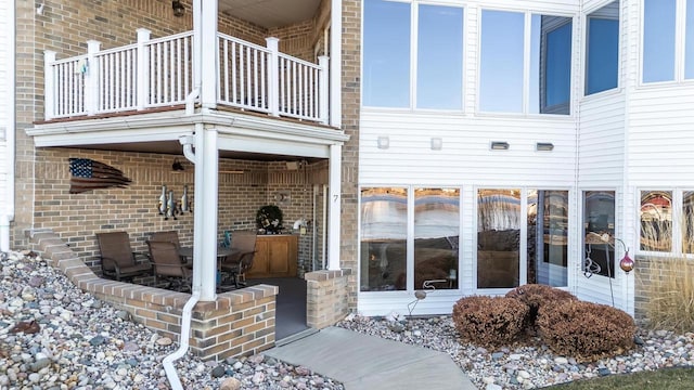 doorway to property featuring a balcony