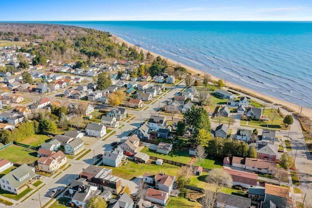 bird's eye view with a view of the beach and a water view