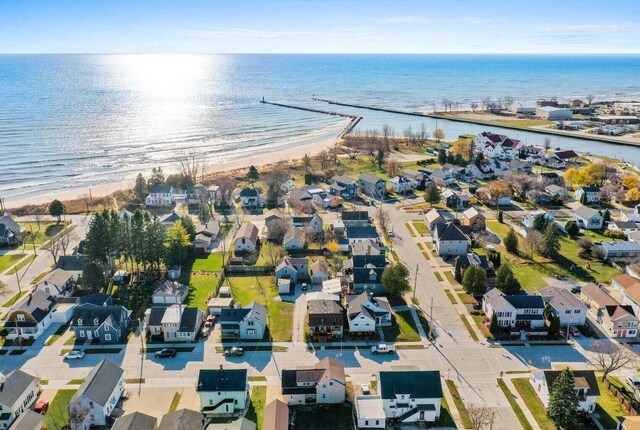 aerial view featuring a beach view and a water view