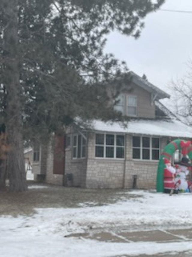 view of snow covered property