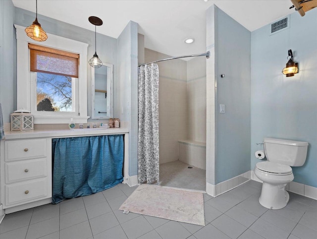 bathroom with toilet, tile patterned flooring, vanity, and a shower with shower curtain