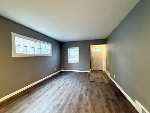 interior space featuring dark wood-type flooring